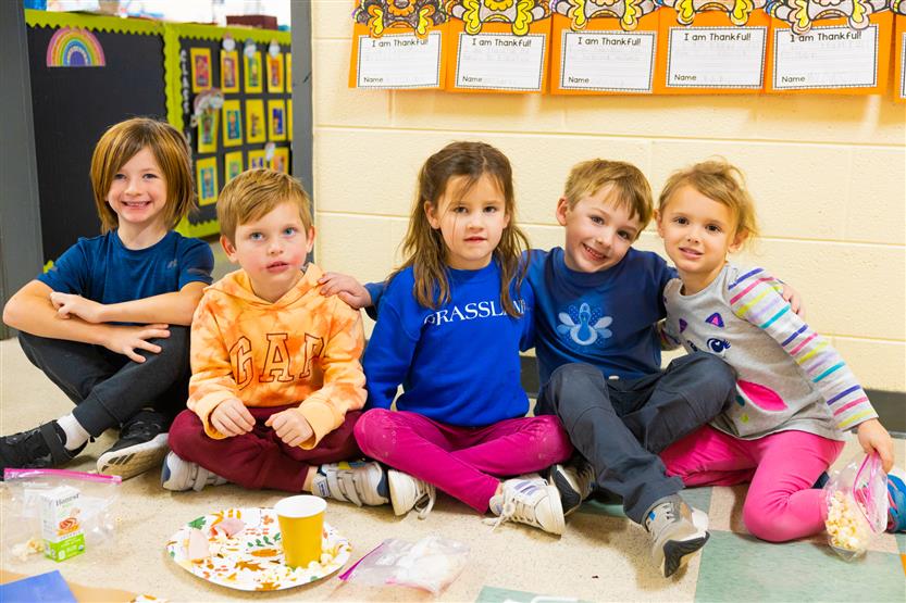 Students eat a Thanksgiving snack